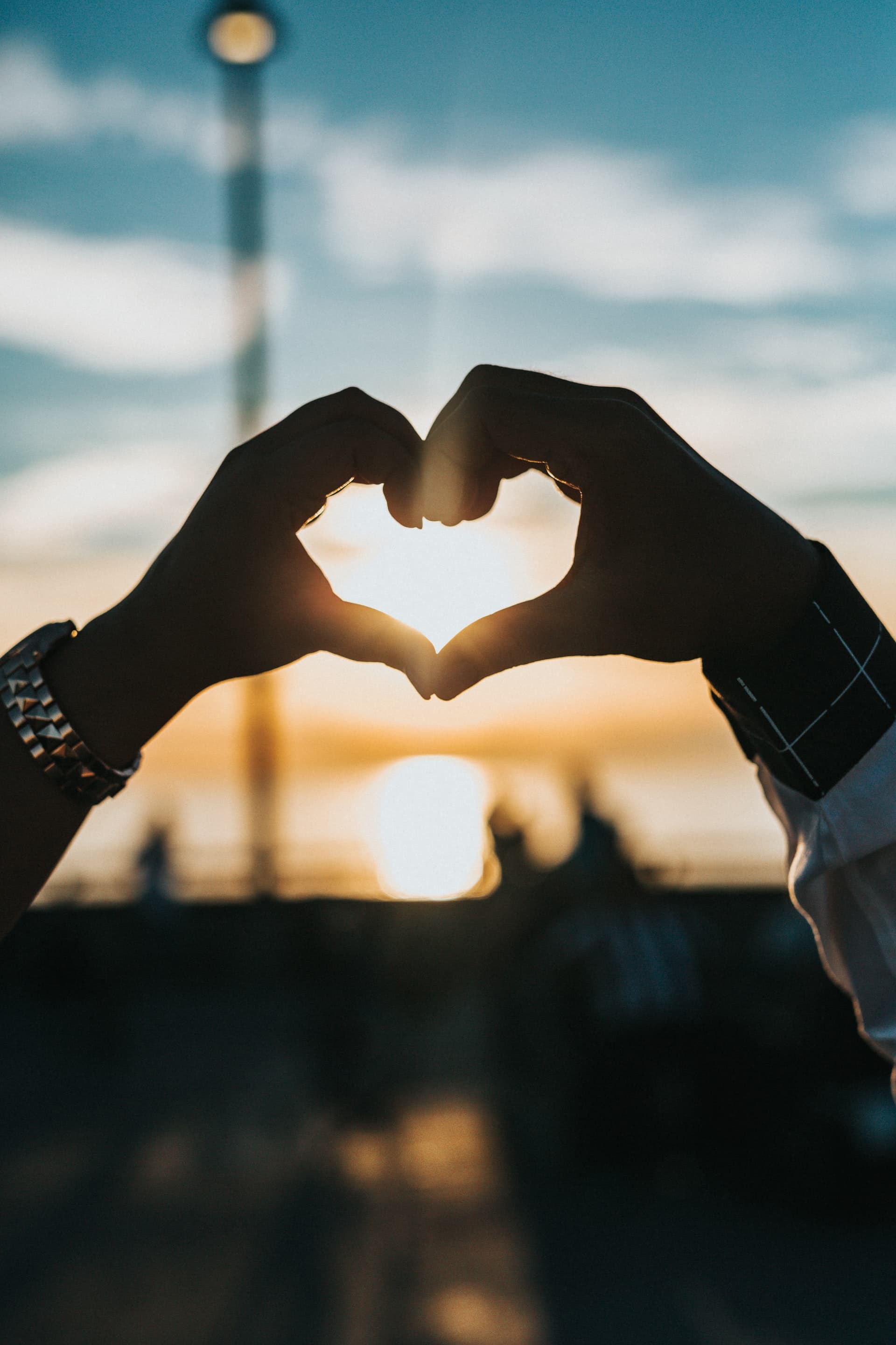 Hands holding a red heart